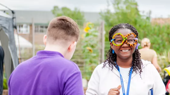 st piers social worker smiling at the camera wearing fancy dress