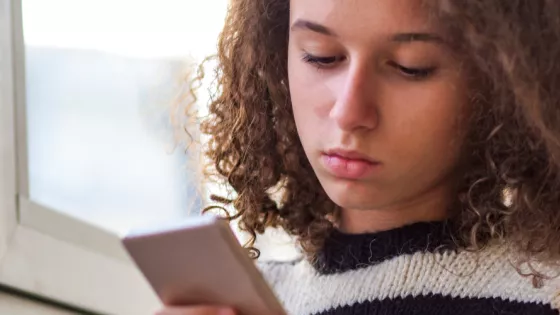young person using phone