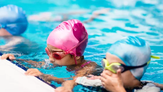 Photo of children in a swimming lesson
