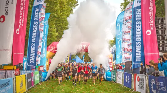 Smoke cannons and walkers at start line