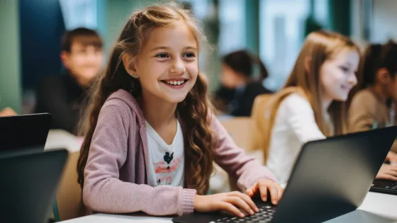 young girl on her laptop to show healthy connections via an online youth club