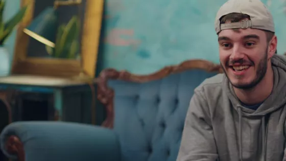 Picture of Joe sitting on couch