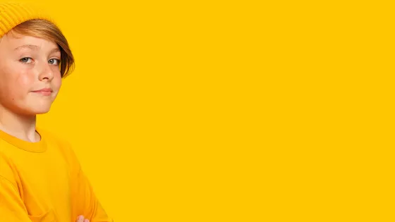 Young boy poses wearing yellow for #UnderstandMyEpilepsy campaign
