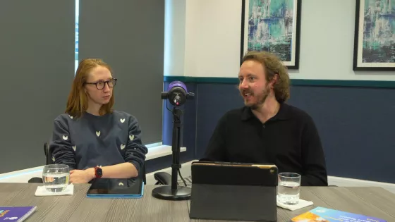 A young person and experts sit on a panel for a podcast about transitions into adult healthcare and epilepsy
