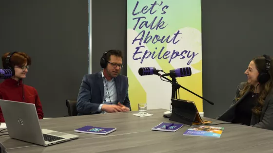 A young person and experts sit on a panel for a podcast about mental health and epilepsy