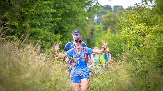 Walker through long grass