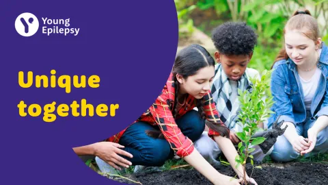 A group of children study something in a garden on the front slide of a Powerpoint presentation.