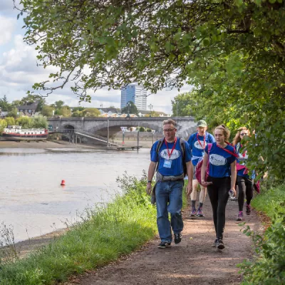 Walkers next to river