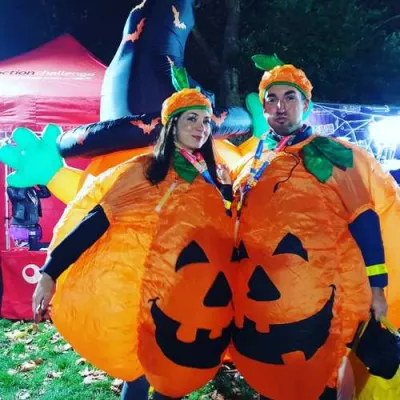 Couple dressed as pumpkins