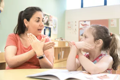 Special Education Needs Teacher with pupil