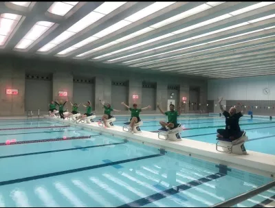 people sat by the swim lanes