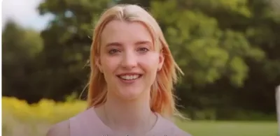 Young Person smiling at the camera