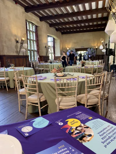 A Young Epilepsy fundraising table overlooks an elegant ballroom on 'The Only Way is Essex'.