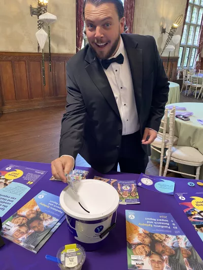 A TOWIE cast member donates money to Young Epilepsy at a ball.