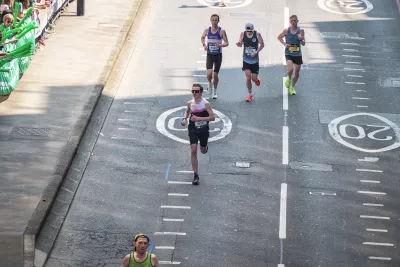 A London Marathon runner, Jack, powers along the route.