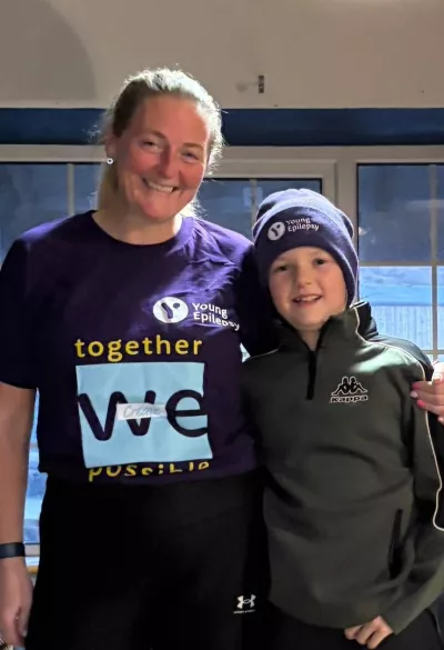 A mother and son wear Young Epilepsy merchandise.