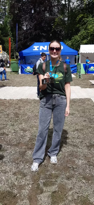 Women posing with great north swim medal