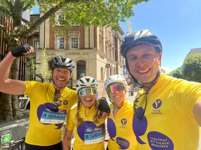 group of smiling cyclists
