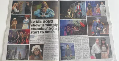 A newspaper lauds the success of a play.