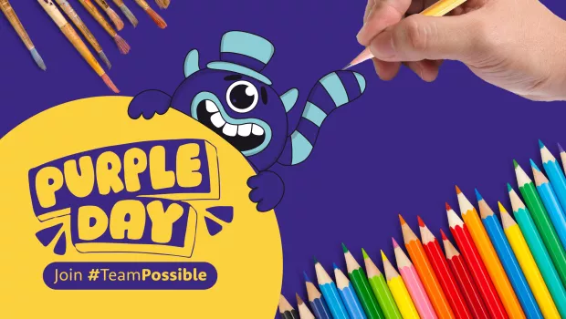 A hand drawing a character to promote our design a t-shirt competition for Purple Day