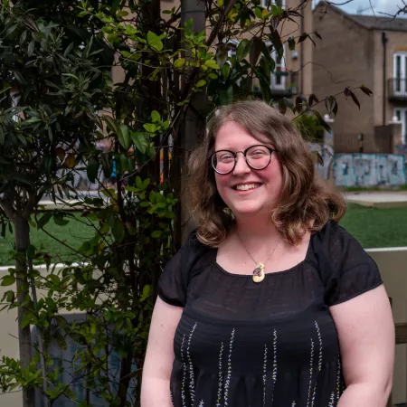 Profile photograph of Annie a Young Rep and Young Yrustee, taken outside in a garden