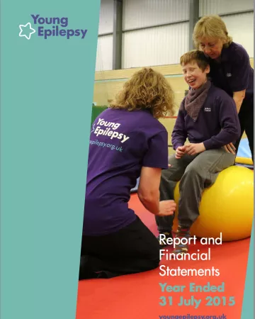A woman at Young Epilepsy makes a child laugh on the Young Epilepsy Annual Report 14-15 cover.