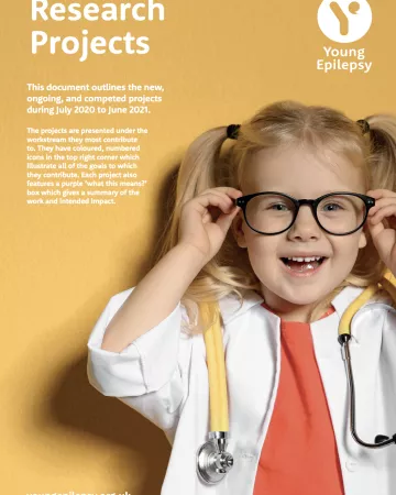 A young girl dressed as a doctor is depicted on the cover of the Research Projects 2021 cover.