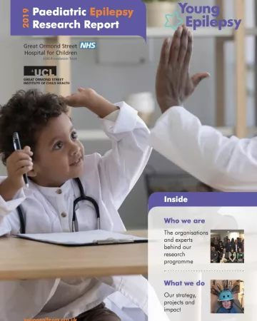 A young child high-fives a medical professional on the cover of a Research Report 2019 cover.