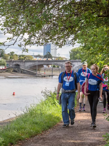 Walkers next to river