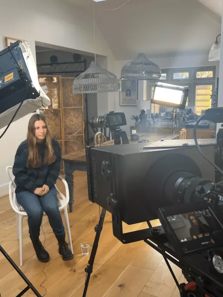 young girl with epilepsy talks about her mental health on camera