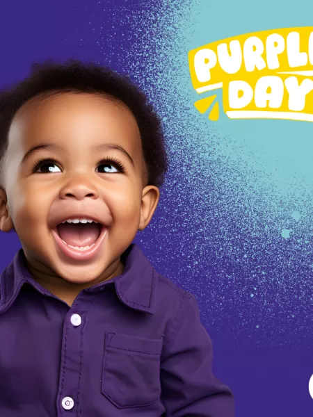 A smiling young boy is featured on a 'Purple Day' poster.