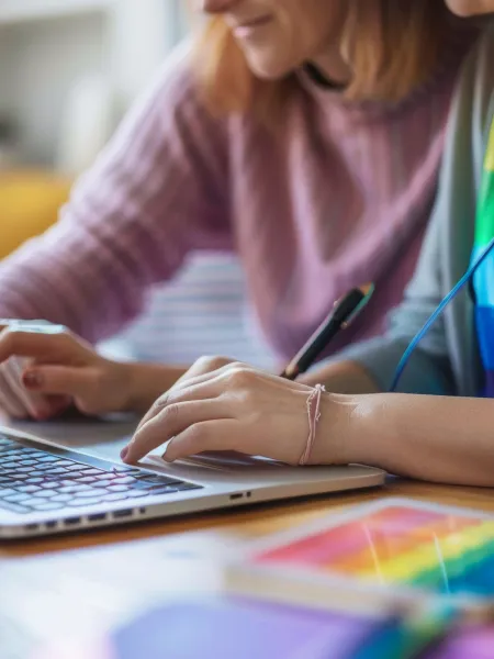 Parent and child on laptop