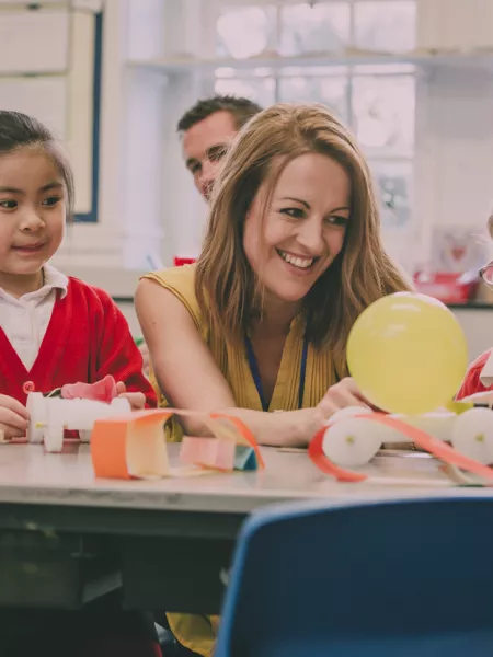 Young children and their teacher