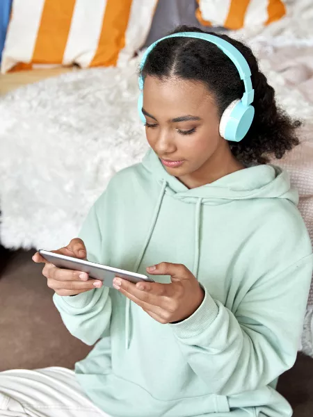 Young girl talking to peers on a video call