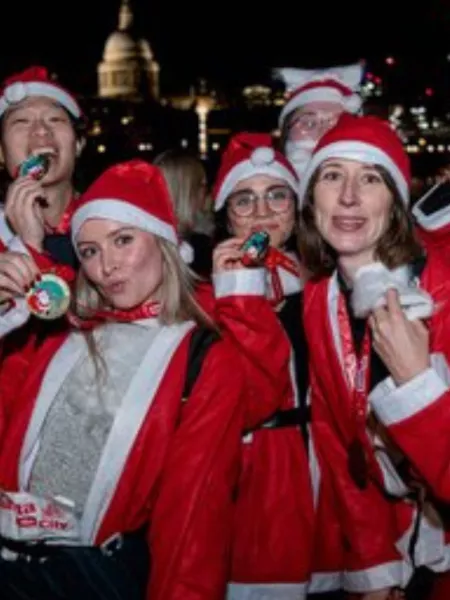 Team of ladies in santa suits