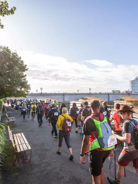 Walkers along the Thames in London