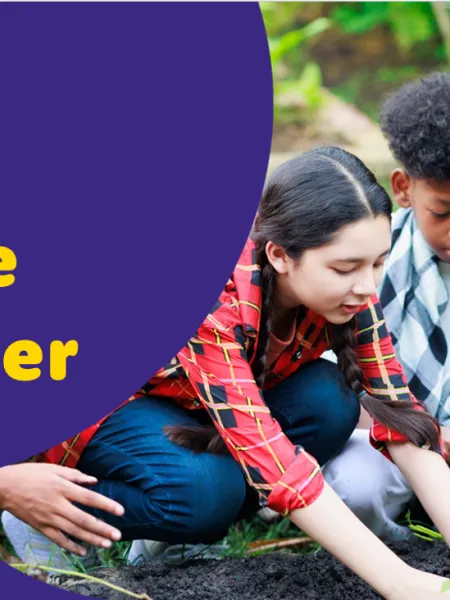 A slide from the 'Unique together' school assembly - group of school children shown gardening