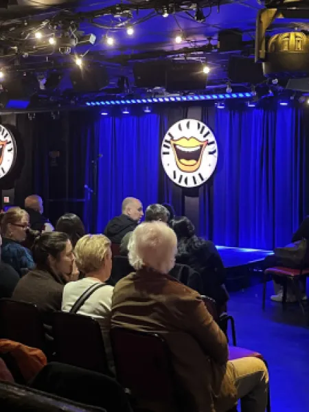 Patrons gather in the audience at the Comedy Store.